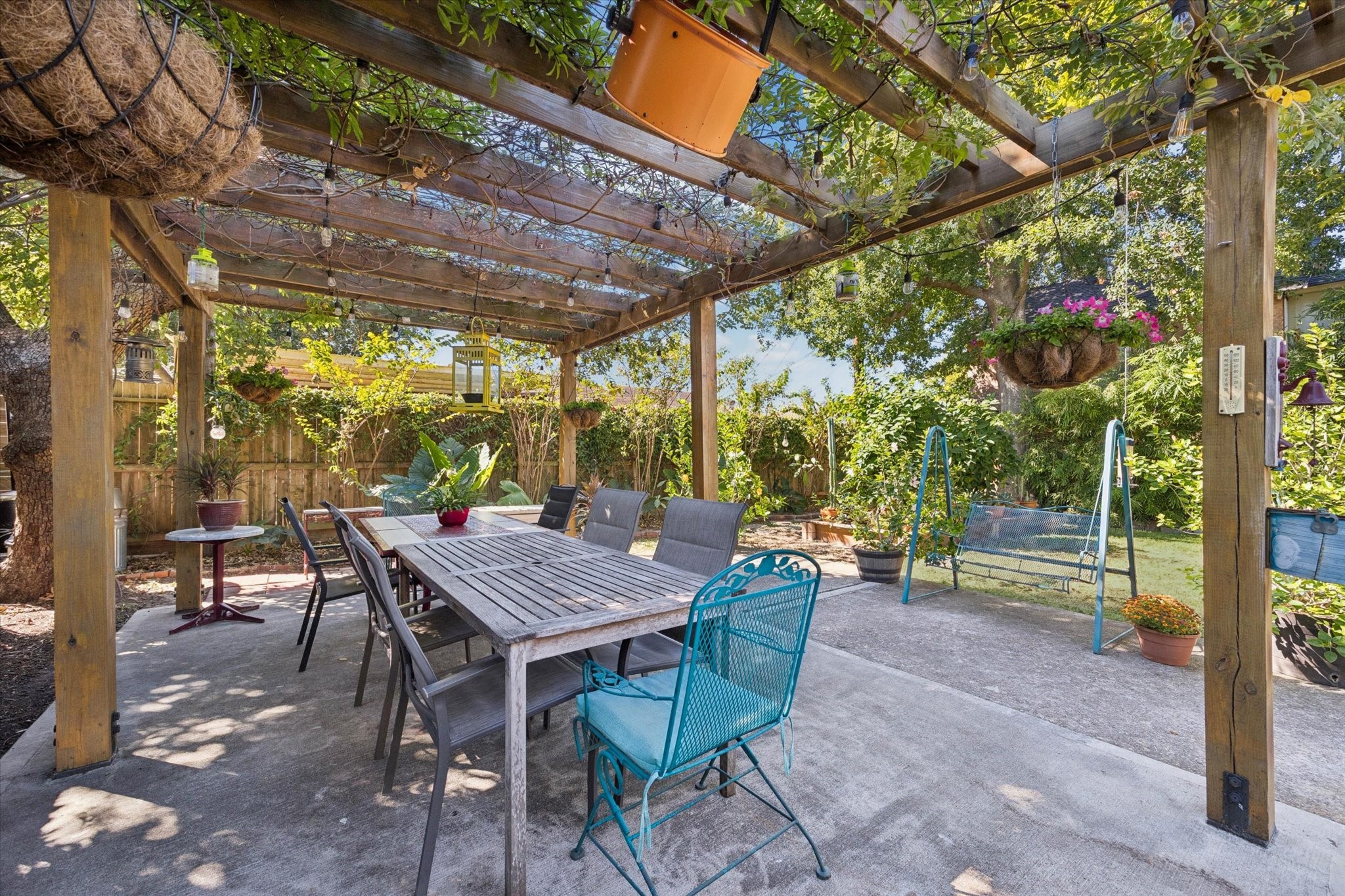 1526 Lawson Street Houston, TX 77023 - Photo 21 of 25 a view of a patio with a table and chairs next to a yard