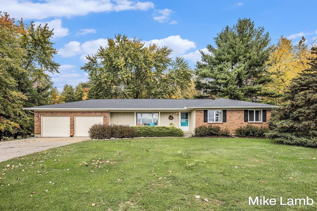 3825 14 Mile Road Northwest Sparta, MI 49345 - Photo 1 of 40 002_14_mile_54_184