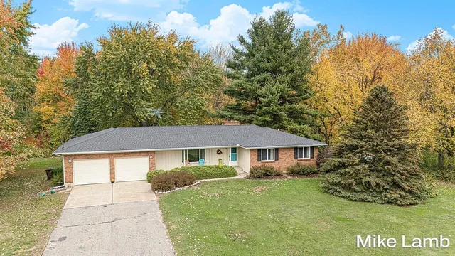 $405,000 | 3825 14 Mile Road Northwest, Sparta, MI 49345