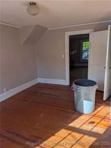 a view of house with backyard and deck