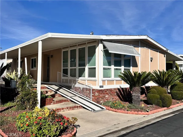 a house view with a garden space