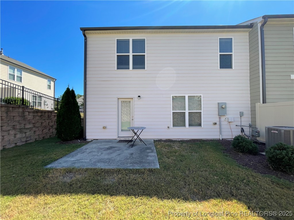 1023 Saffron Loop Durham, NC 27713 - Photo 18 of 18 a view of a back yard of the house