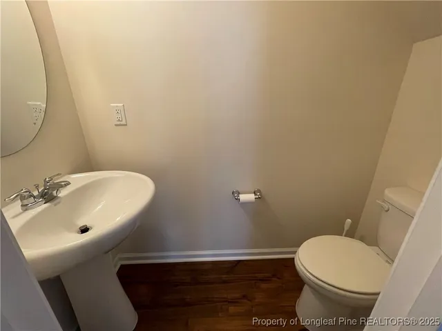 a bathroom with a sink and a toilet