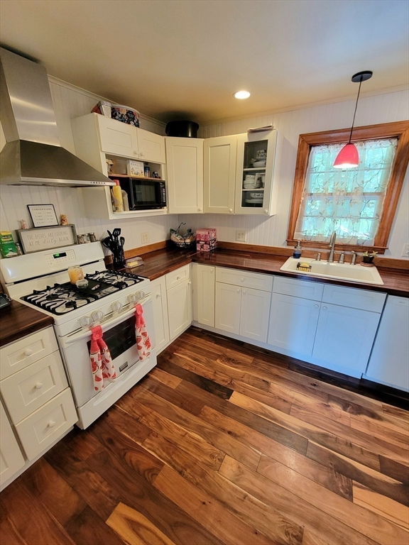 1619 Barre Road Hardwick, MA 01031 - Photo 7 of 31 a kitchen with stainless steel appliances granite countertop a stove and a sink