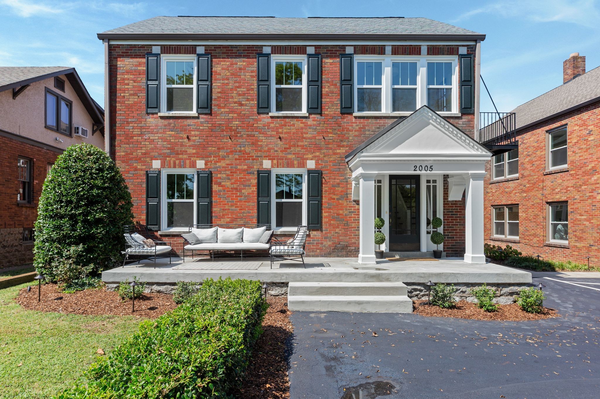 2005 Convent Place, Unit 1 Nashville, TN 37212 - Photo 2 of 41 front view of a house with a yard