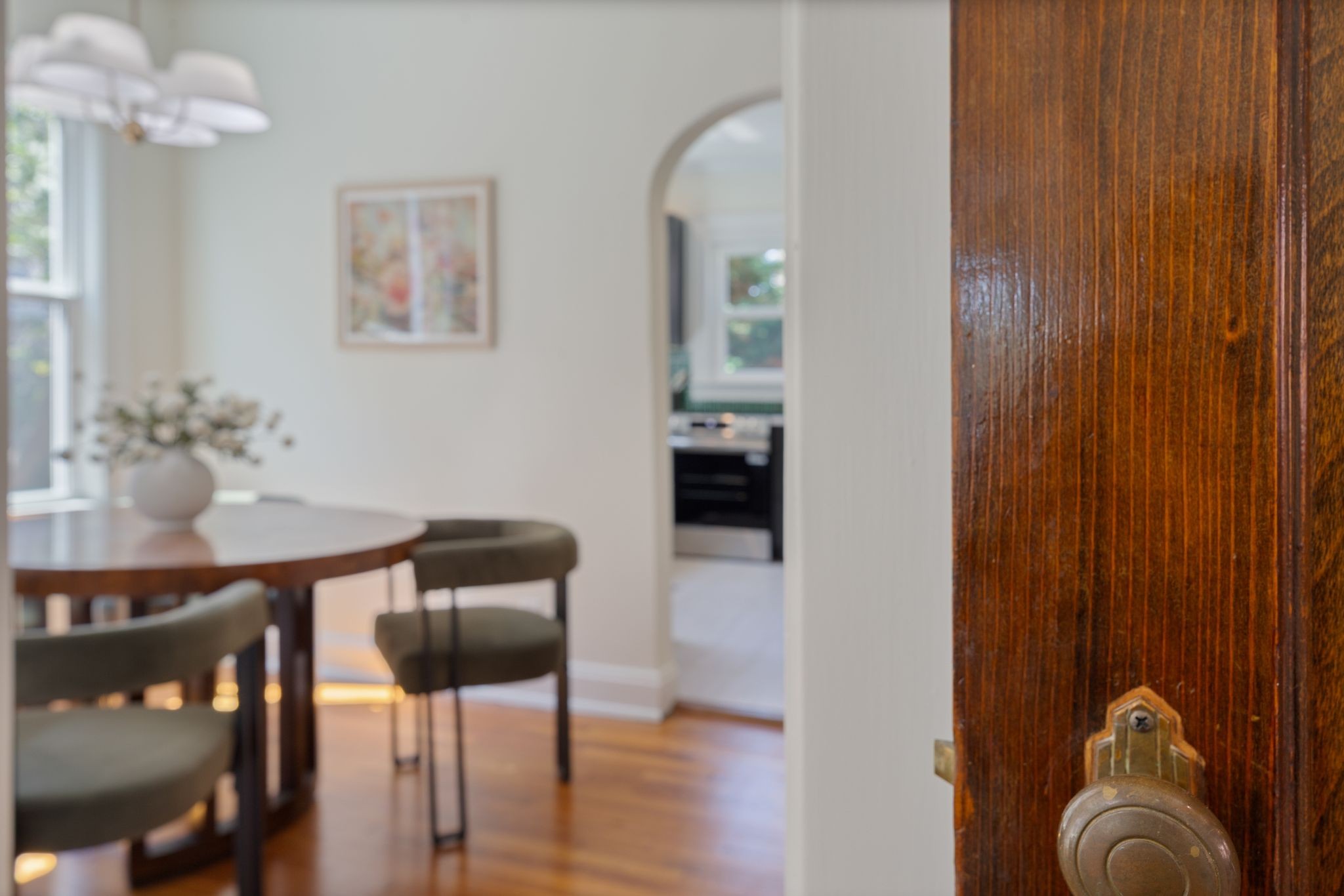 2005 Convent Place, Unit 1 Nashville, TN 37212 - Photo 22 of 41 a view of a dining room with furniture and wooden floor