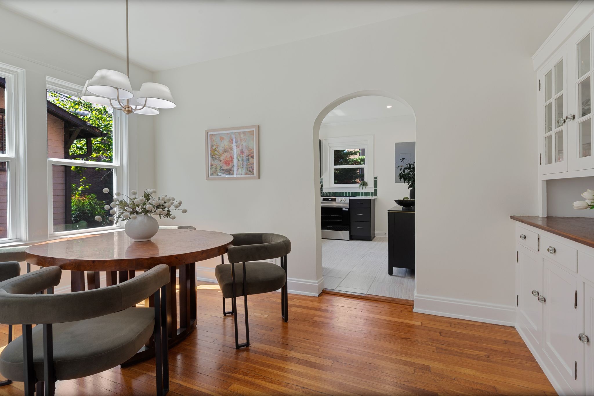 2005 Convent Place, Unit 1 Nashville, TN 37212 - Photo 23 of 41 a view of a dining room with furniture window and wooden floor