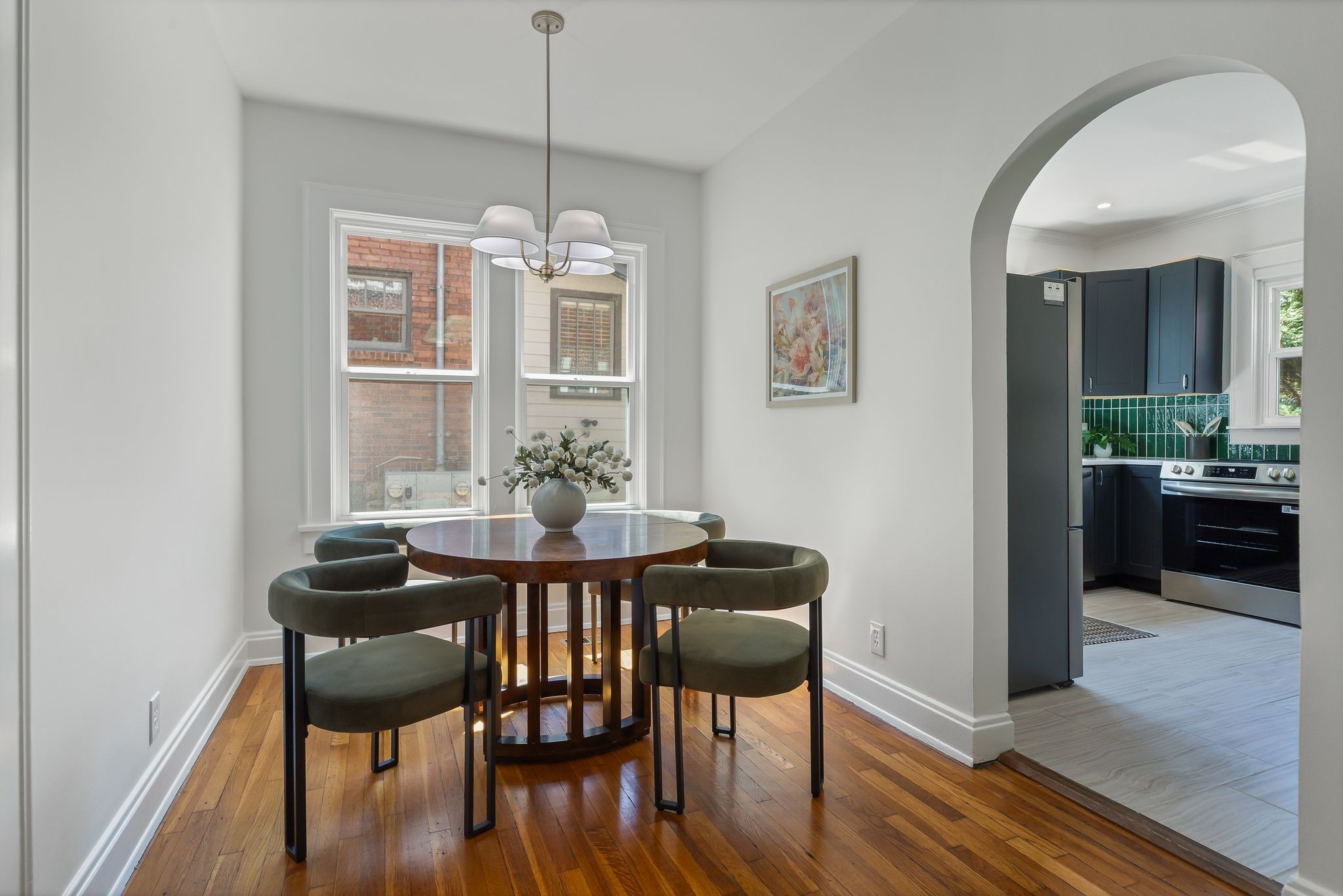 2005 Convent Place, Unit 1 Nashville, TN 37212 - Photo 25 of 41 a view of a dining room with furniture window and wooden floor