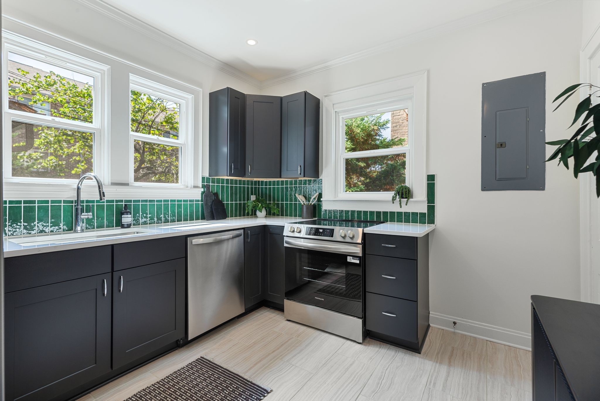 2005 Convent Place, Unit 1 Nashville, TN 37212 - Photo 28 of 41 a kitchen with a window and wooden cabinets