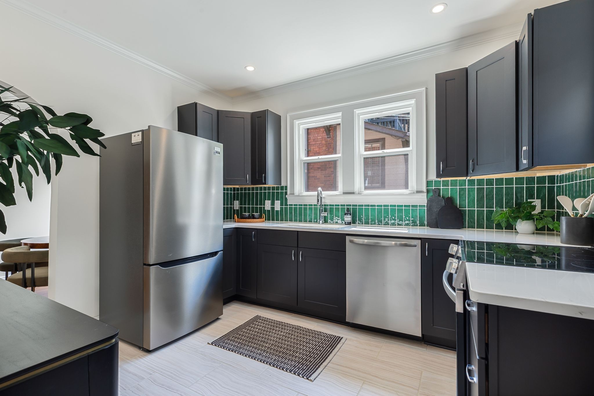2005 Convent Place, Unit 1 Nashville, TN 37212 - Photo 29 of 41 a kitchen with stainless steel appliances granite countertop a refrigerator and a sink