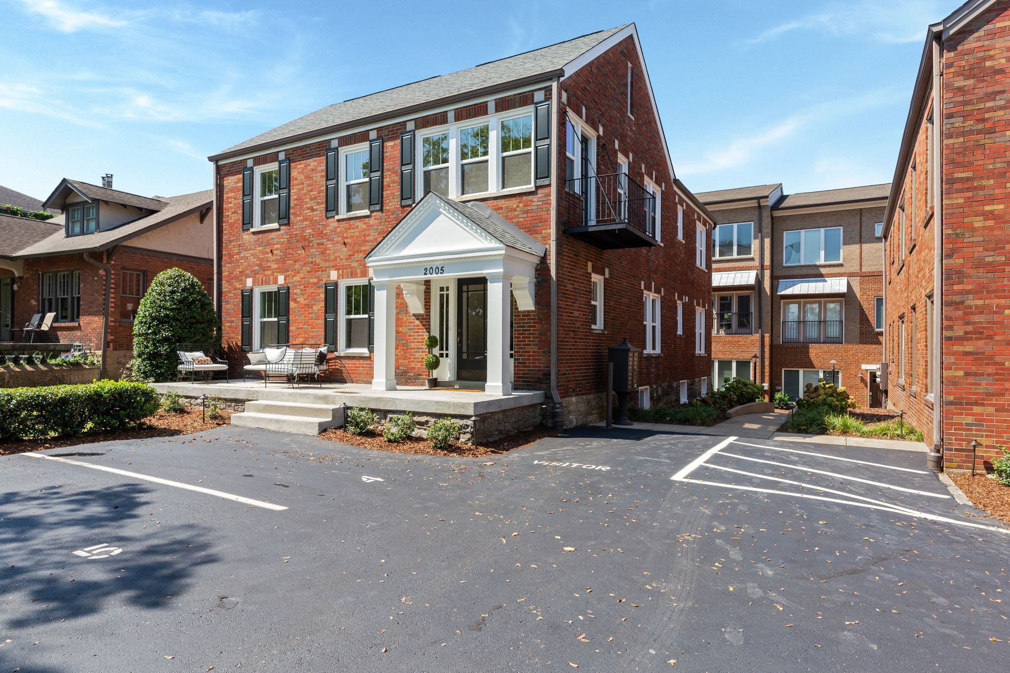 2005 Convent Place, Unit 1 Nashville, TN 37212 - Photo 3 of 41 a front view of a building with street