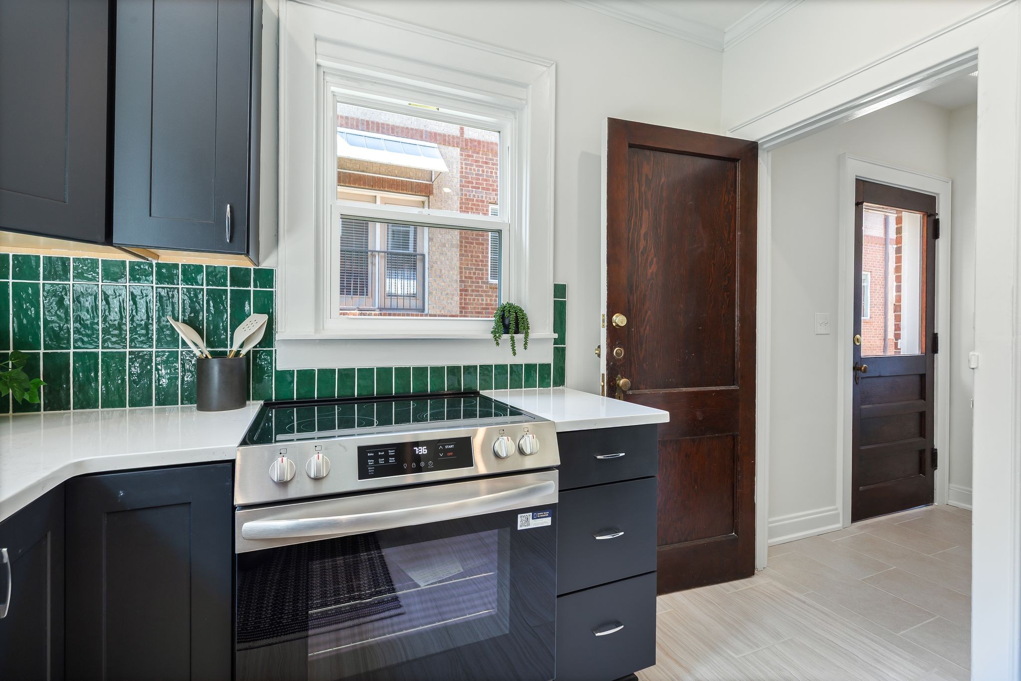 2005 Convent Place, Unit 1 Nashville, TN 37212 - Photo 31 of 41 a bathroom with a sink and a window