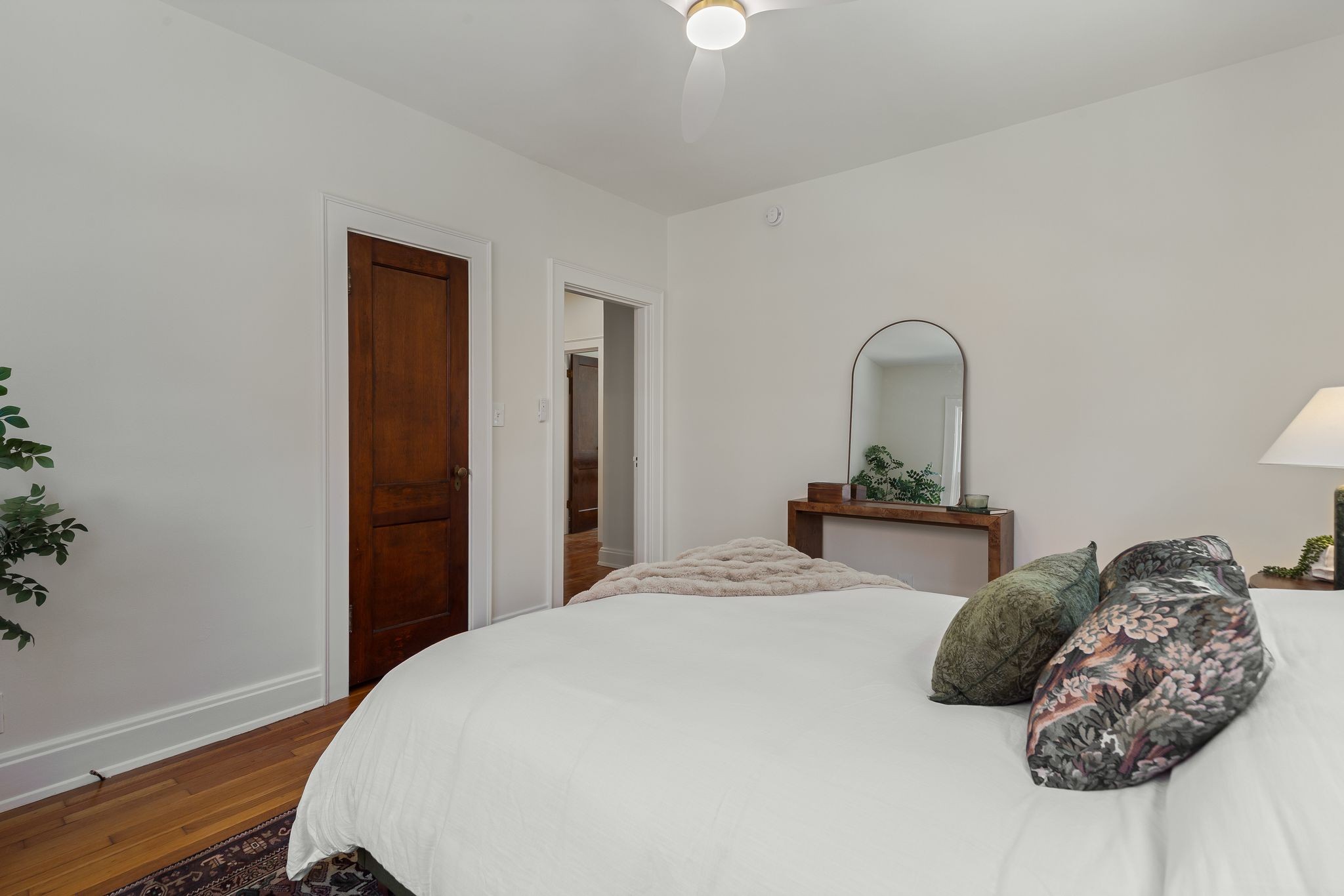 2005 Convent Place, Unit 1 Nashville, TN 37212 - Photo 34 of 41 a bedroom with a bed and a potted plant