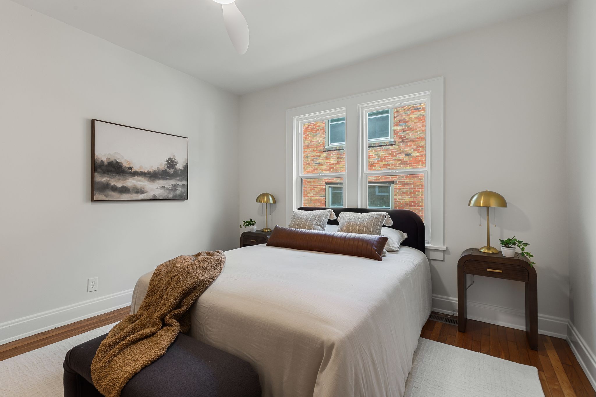 2005 Convent Place, Unit 1 Nashville, TN 37212 - Photo 36 of 41 a bedroom with a bed and a lamp on the dresser