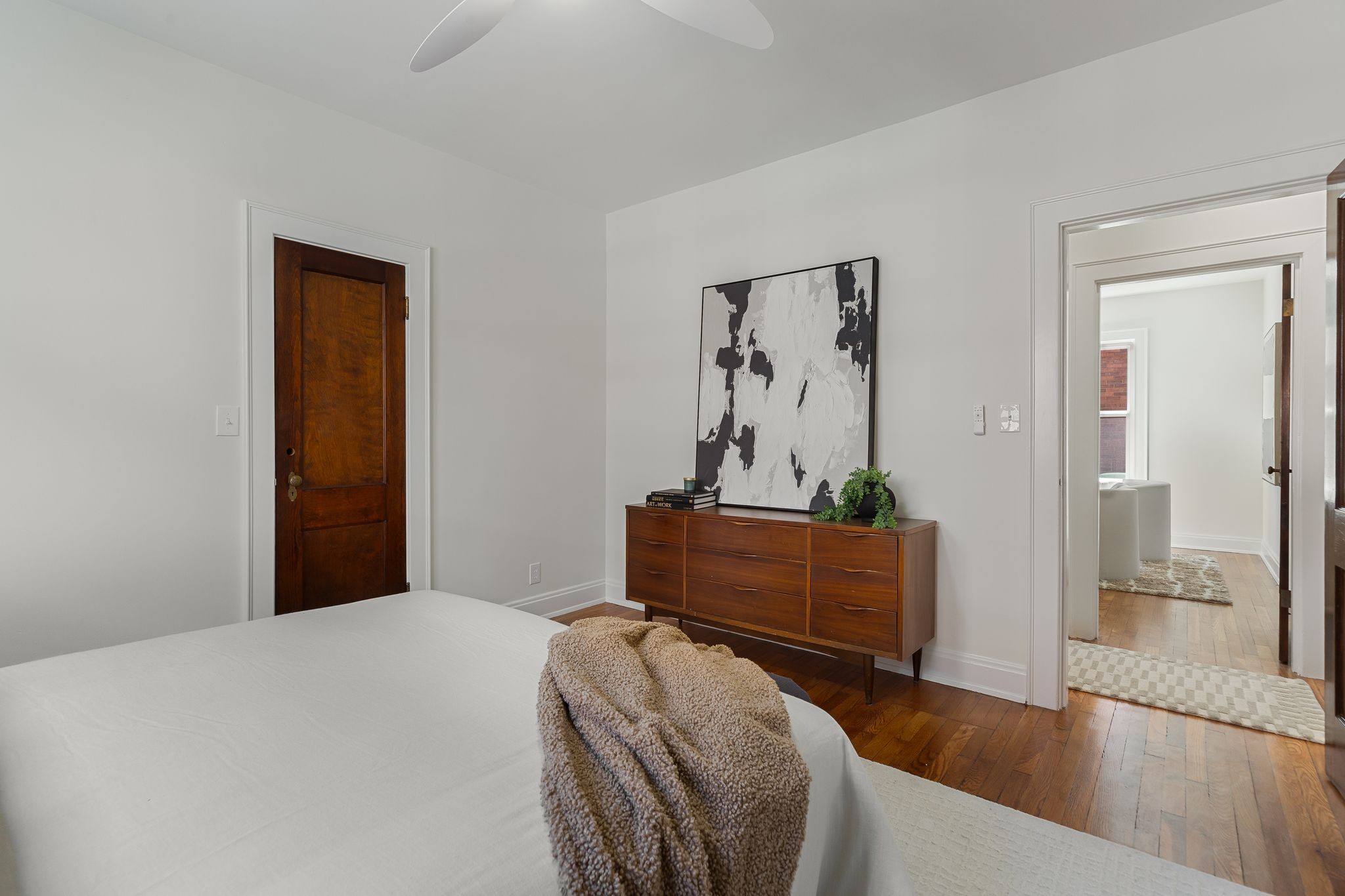 2005 Convent Place, Unit 1 Nashville, TN 37212 - Photo 37 of 41 a bedroom with a bed and a dresser