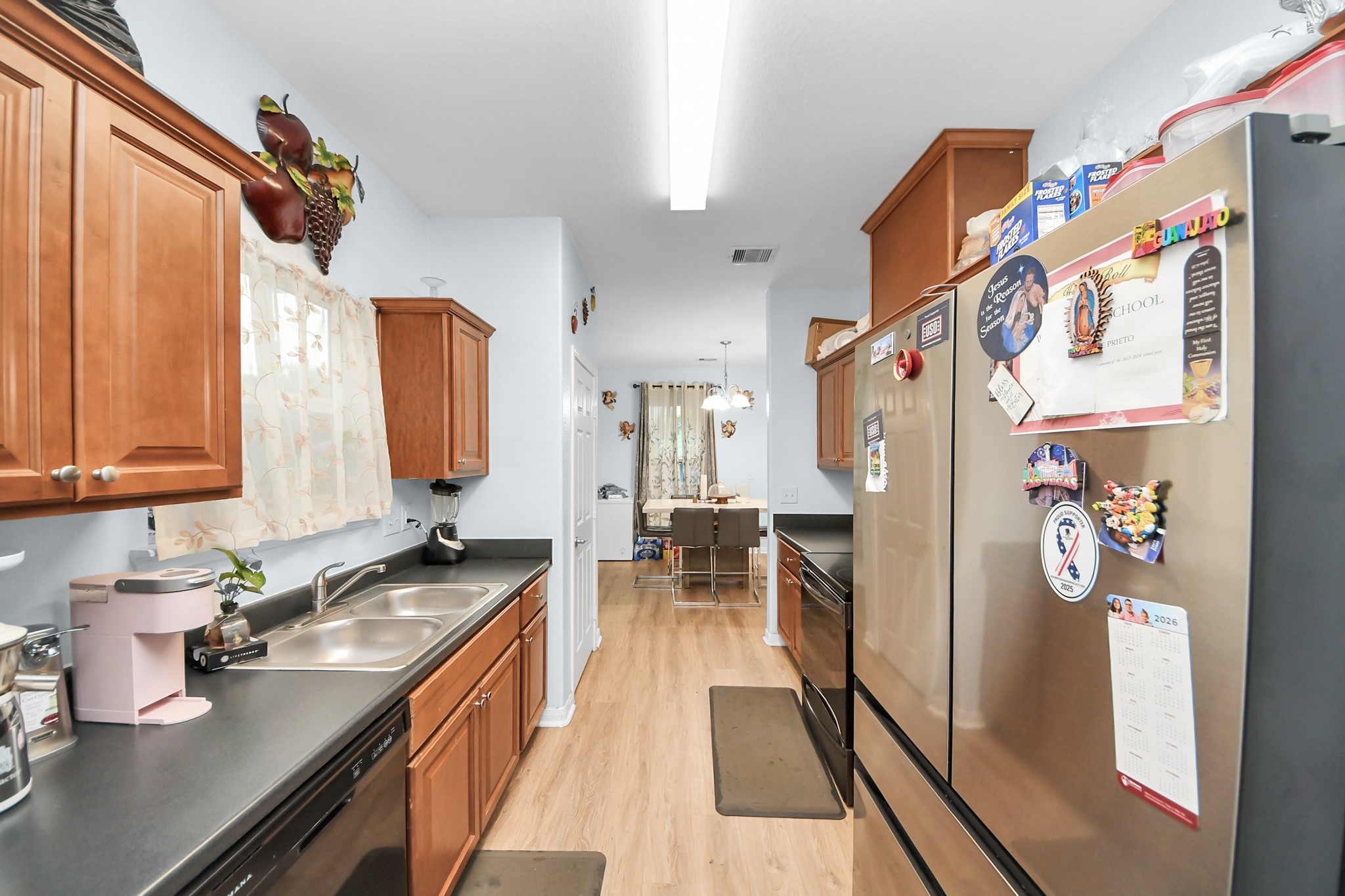 5319 Avenue R Galveston, TX 77551 - Photo 6 of 20 a kitchen with a sink appliances and cabinets