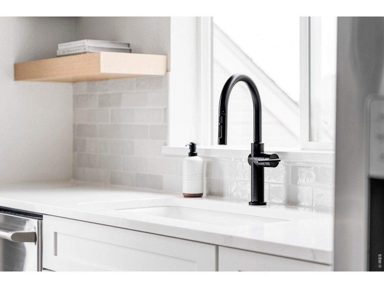 4954 10th Street Boulder, CO 80304 - Photo 13 of 21 a bathroom with a sink
