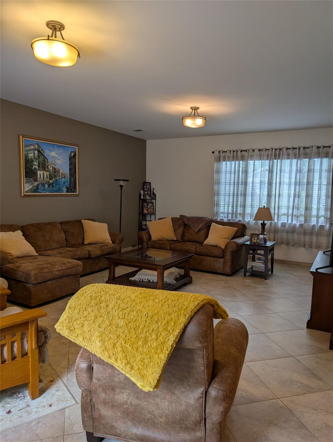 15 Lenzie Street Staten Island, NY 10312 - Photo 8 of 19 a living room with furniture and a large window
