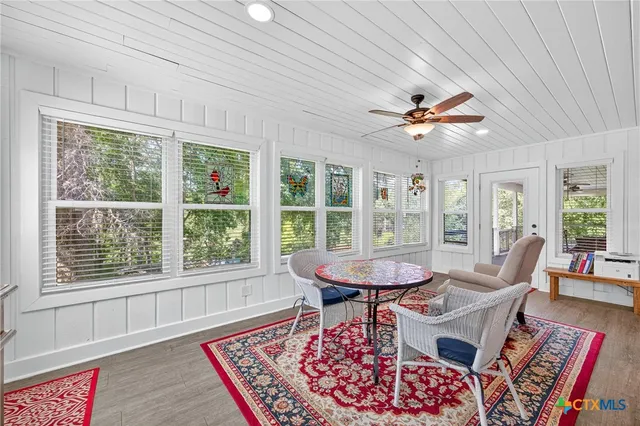 a bedroom with bed and a window