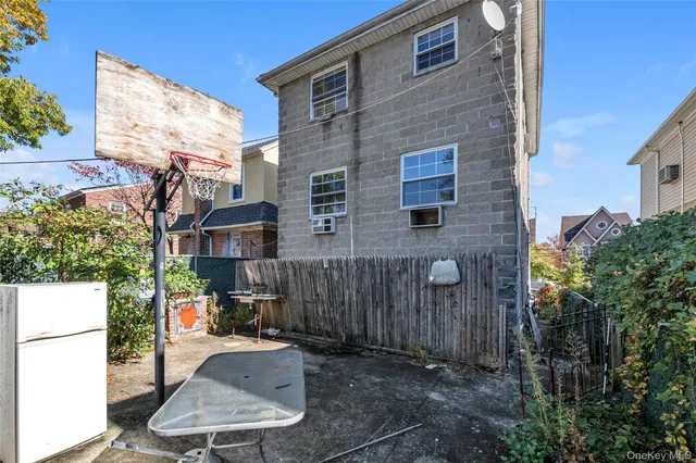 a backyard of a house with seating space