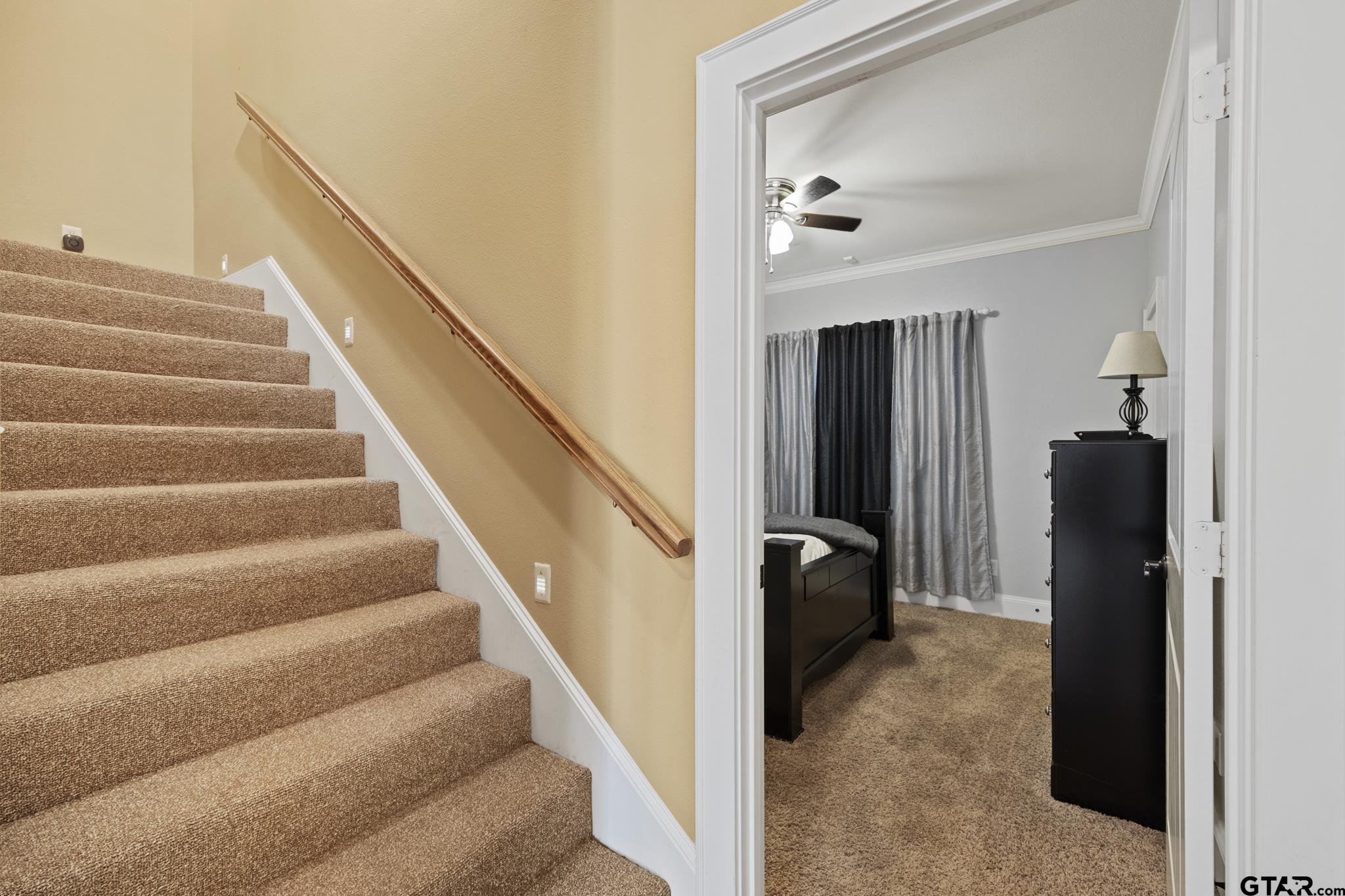 19950 Post Oak Bend Lindale, TX 75771 - Photo 29 of 42 a view of hallway with stairs and wooden floor