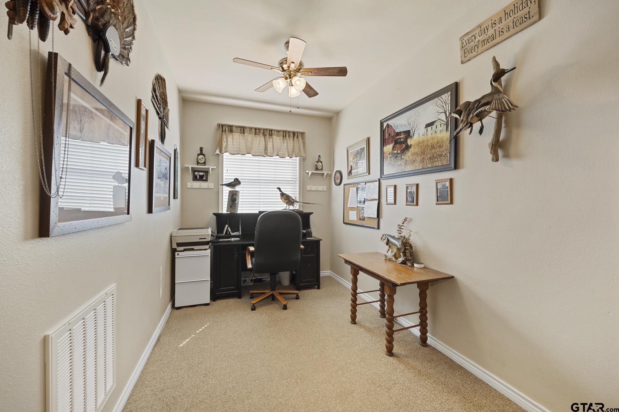 19950 Post Oak Bend Lindale, TX 75771 - Photo 33 of 42 a view of a workspace with furniture and a window