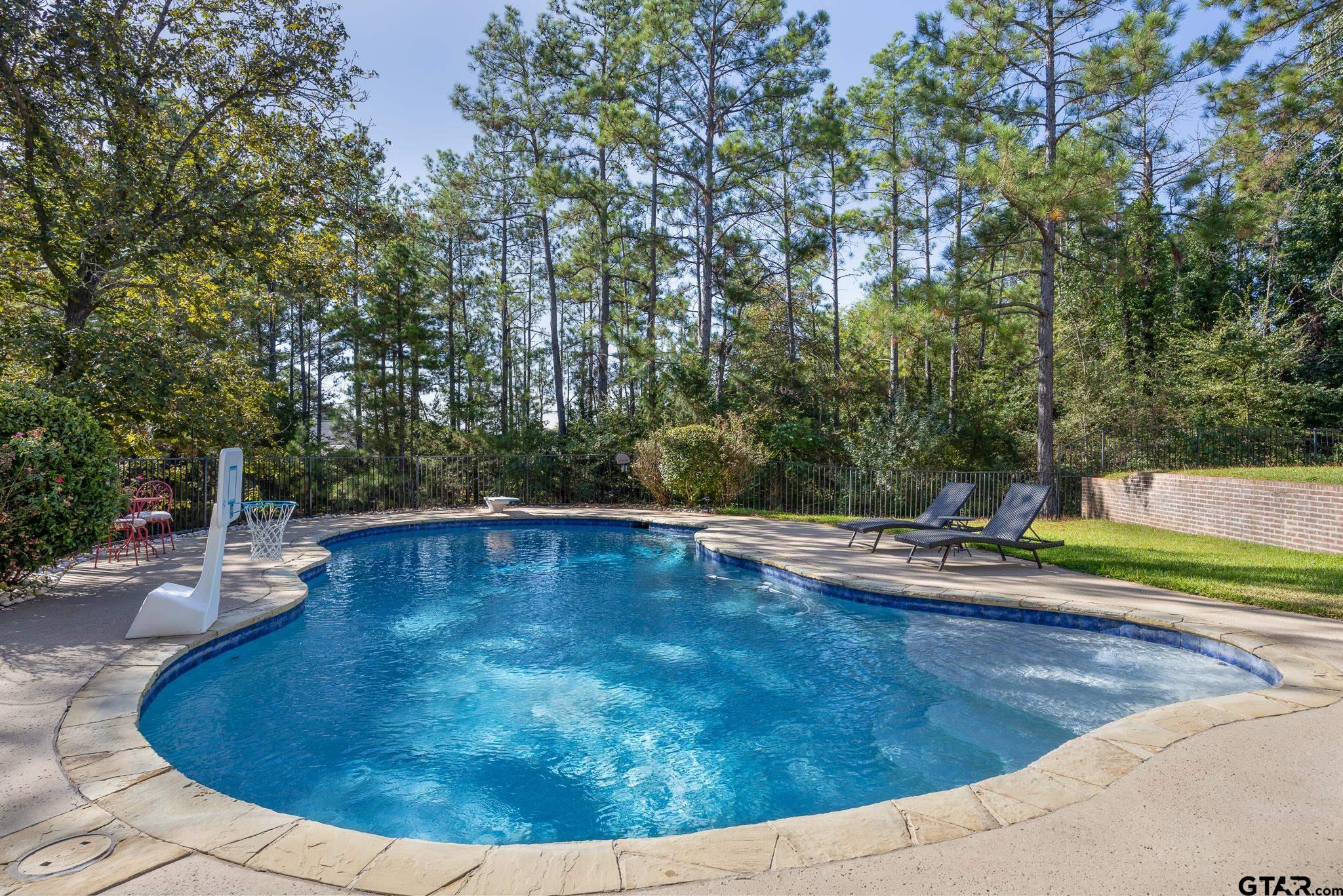 19950 Post Oak Bend Lindale, TX 75771 - Photo 36 of 42 a view of a swimming pool with an outdoor space