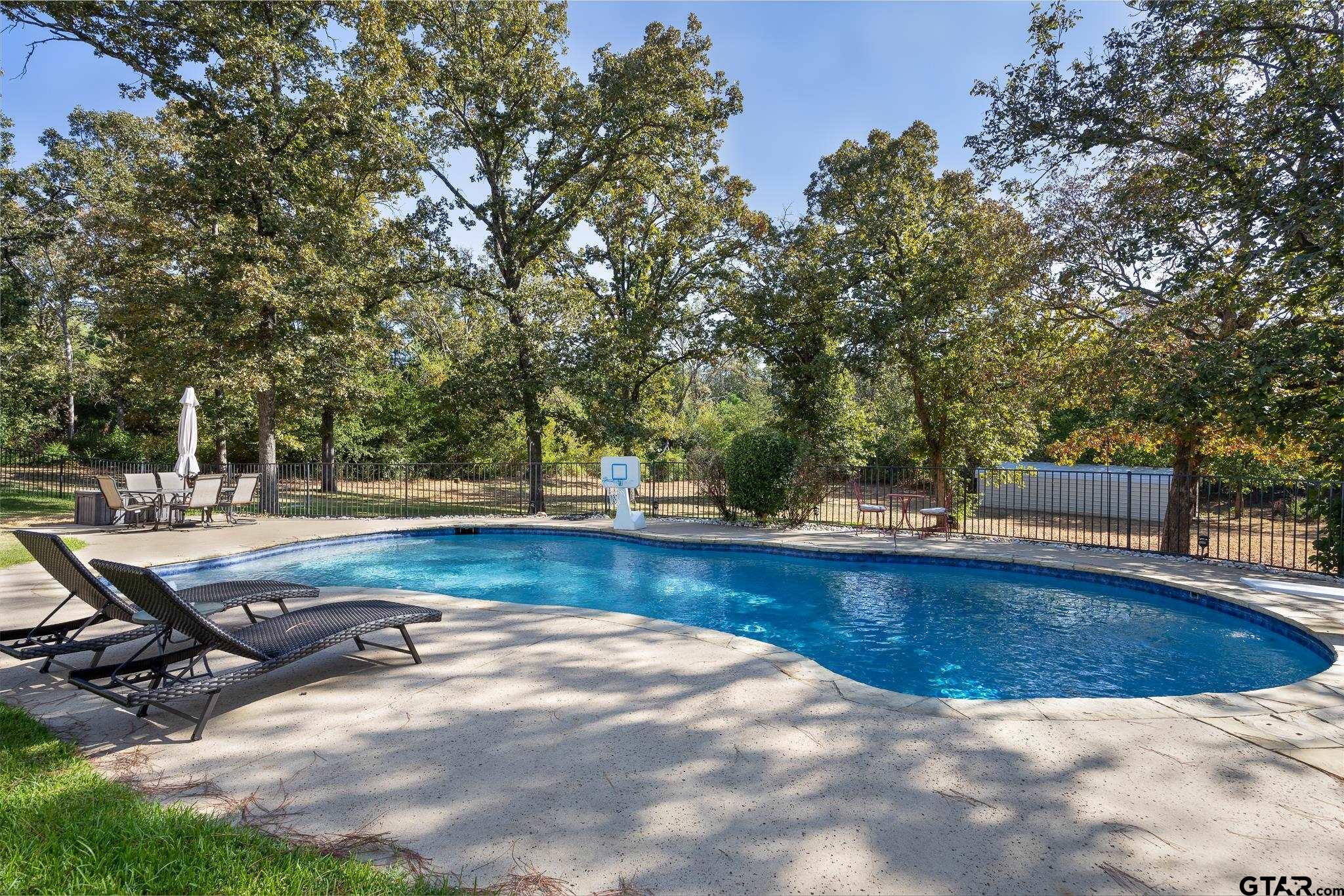 19950 Post Oak Bend Lindale, TX 75771 - Photo 37 of 42 a view of backyard with swimming pool