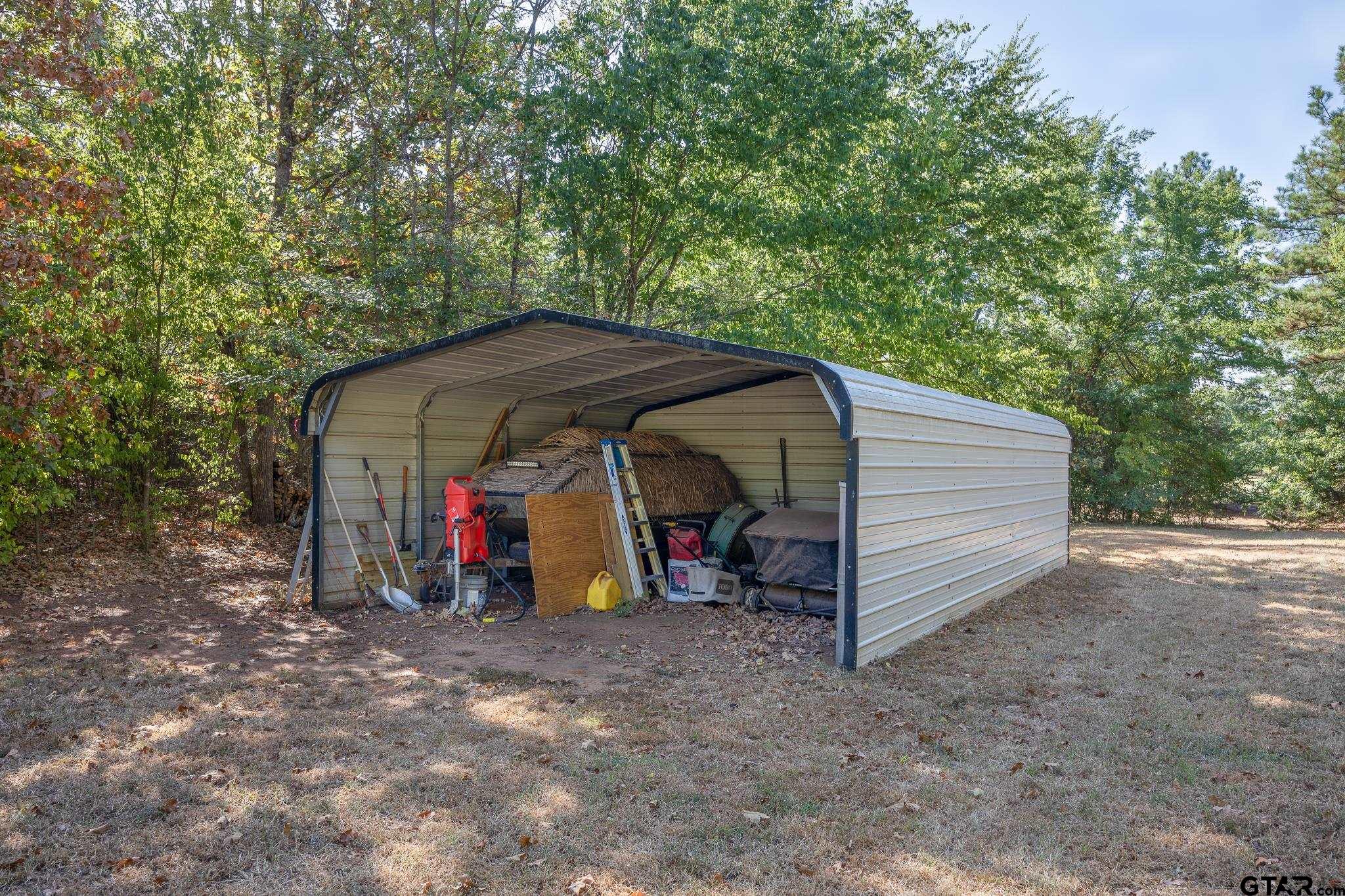 19950 Post Oak Bend Lindale, TX 75771 - Photo 39 of 42 a view of outdoor space and deck
