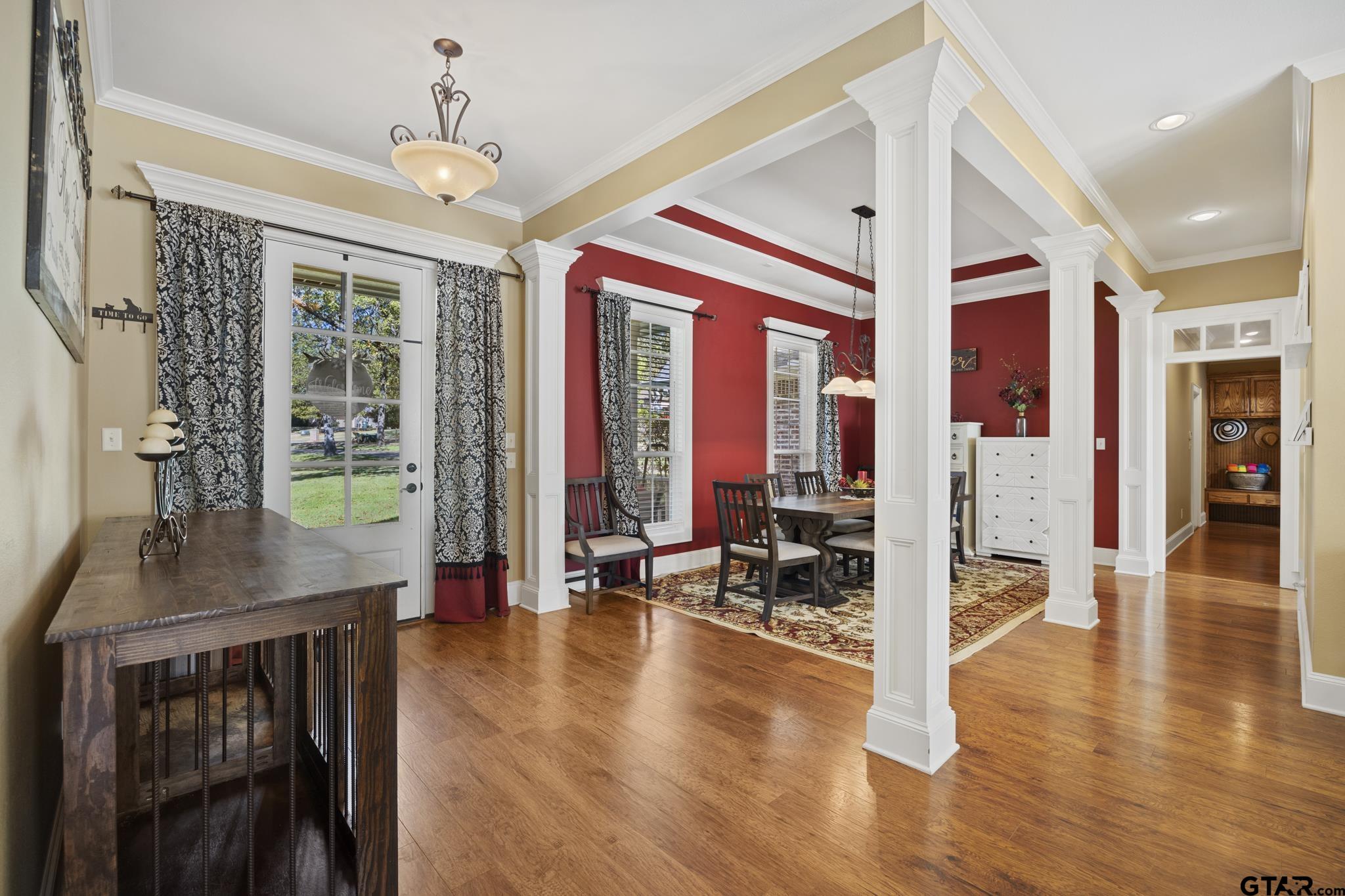 19950 Post Oak Bend Lindale, TX 75771 - Photo 4 of 42 a view of a livingroom with furniture wooden floor and a chandelier