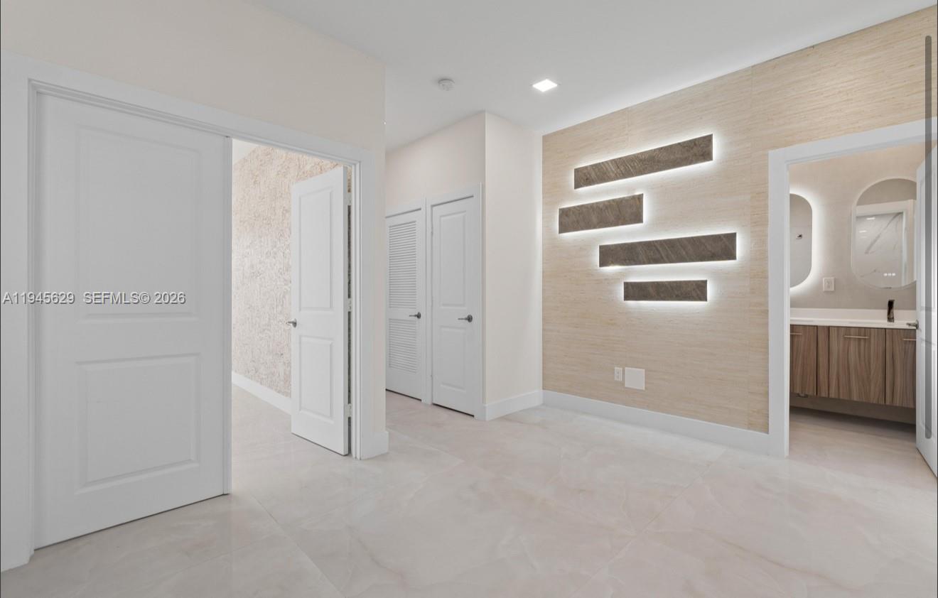 4499 Southwest 173rd Avenue Miramar, FL 33029 - Photo 9 of 11 a view of a bathroom with a sink and a shower