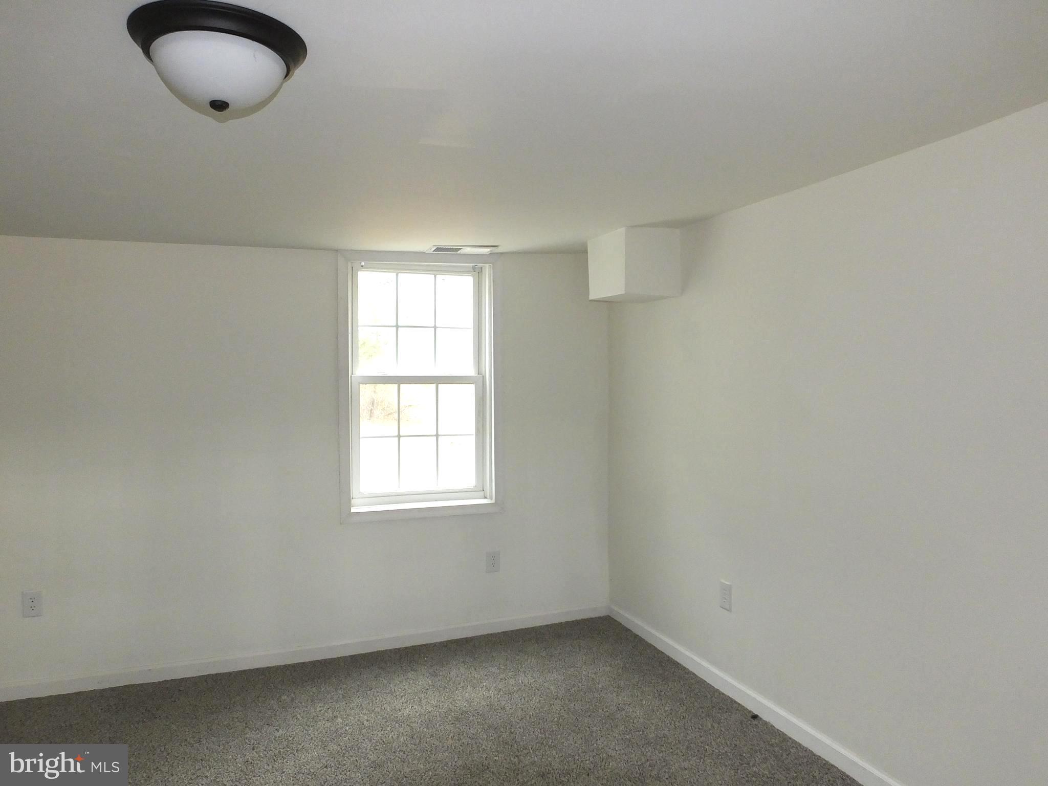 2530 Toddville Road Toddville, MD 21672 - Photo 11 of 24 an empty room with windows
