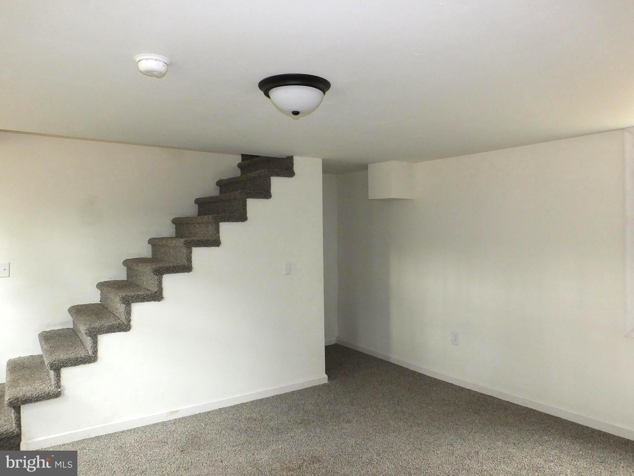 2530 Toddville Road Toddville, MD 21672 - Photo 14 of 24 a view of an empty room with stairs