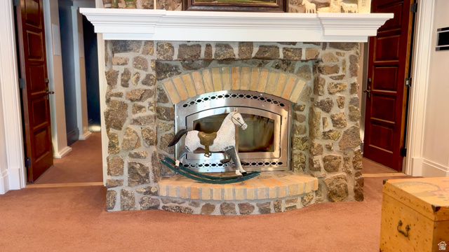 426 West Center Street Parowan, UT 84761 - Photo 64 of 107 Stone-clad fireplace featuring a brick arch and stainless steel insert