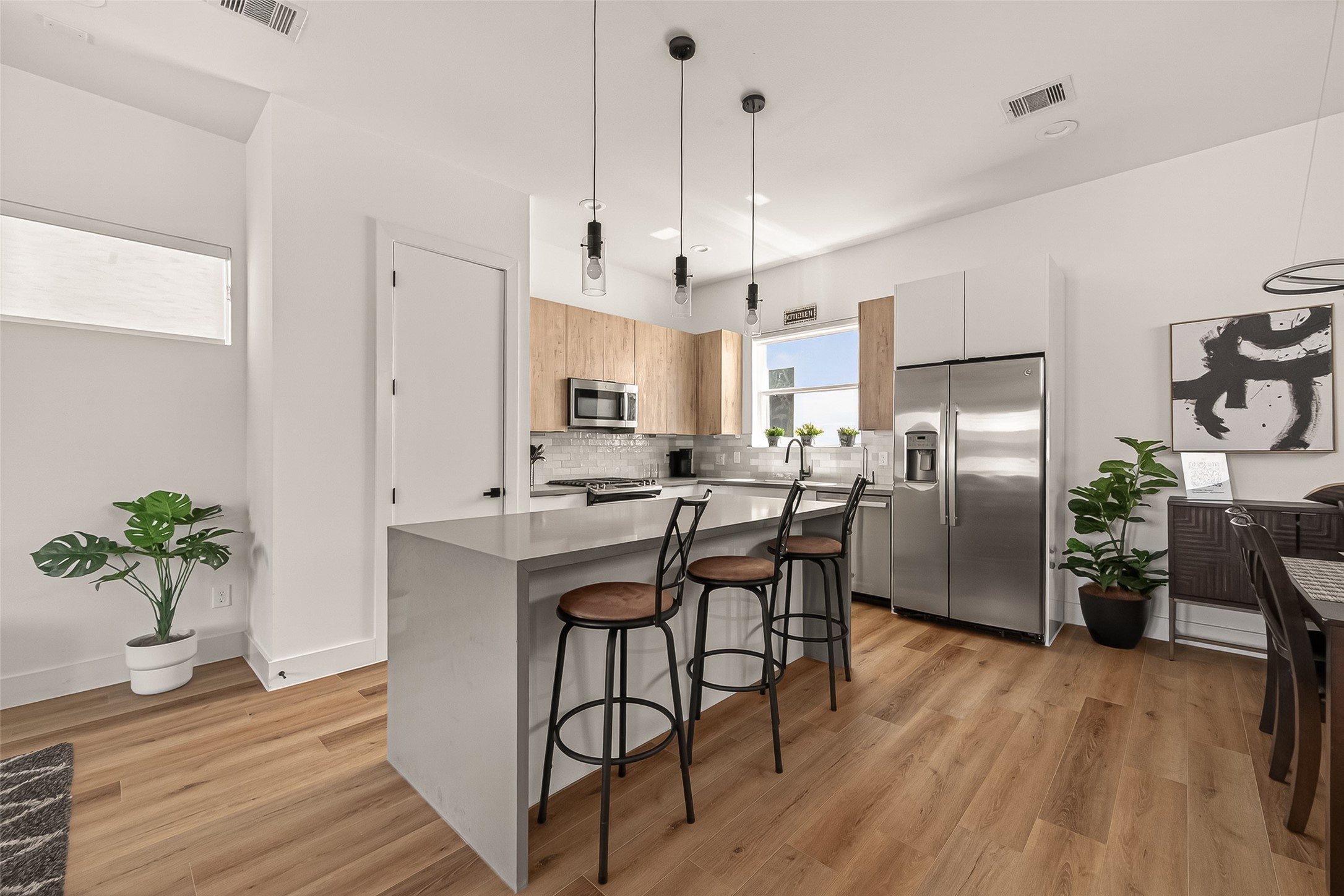 3402 Luca Street Houston, TX 77021 - Photo 15 of 36 a view of a dining room with furniture window and wooden floor