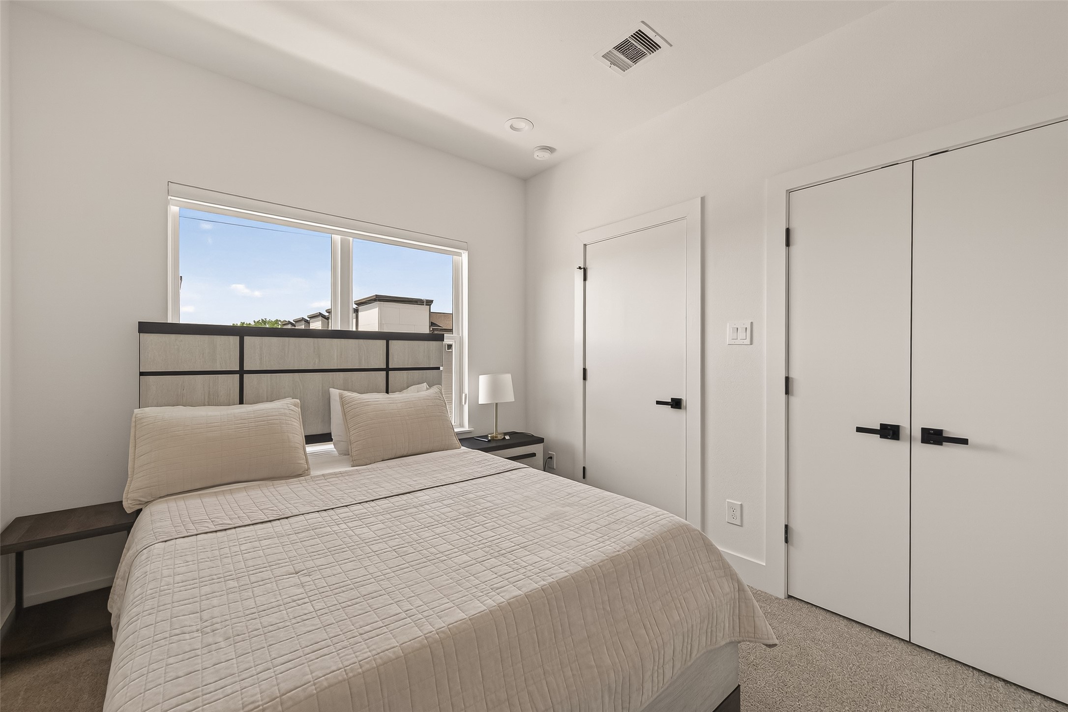 3402 Luca Street Houston, TX 77021 - Photo 19 of 36 a bedroom with a bed and a window