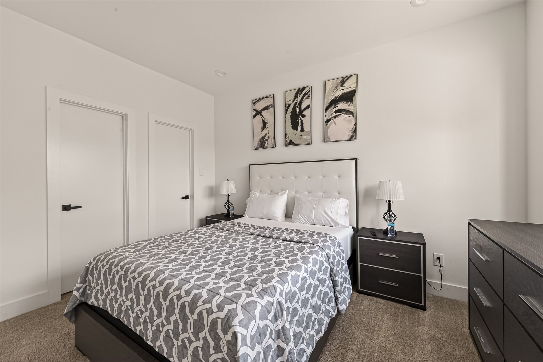 3402 Luca Street Houston, TX 77021 - Photo 21 of 36 a bedroom with a bed and a night stand