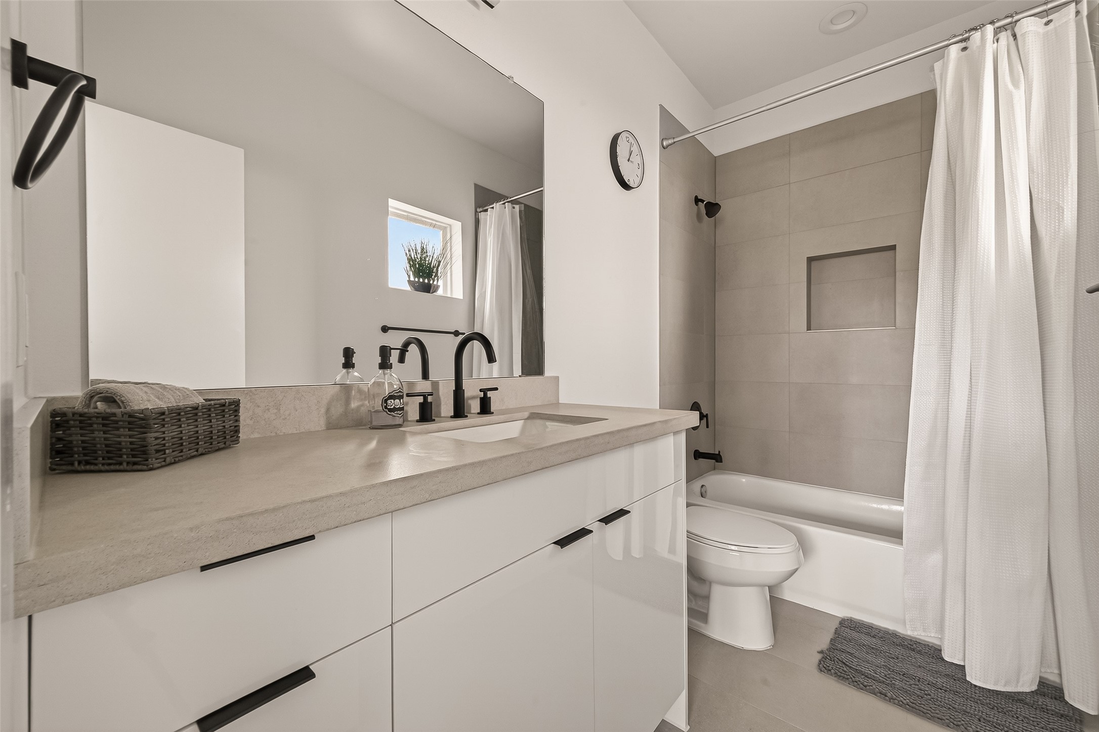 3402 Luca Street Houston, TX 77021 - Photo 23 of 36 a bathroom with a granite countertop sink toilet and shower