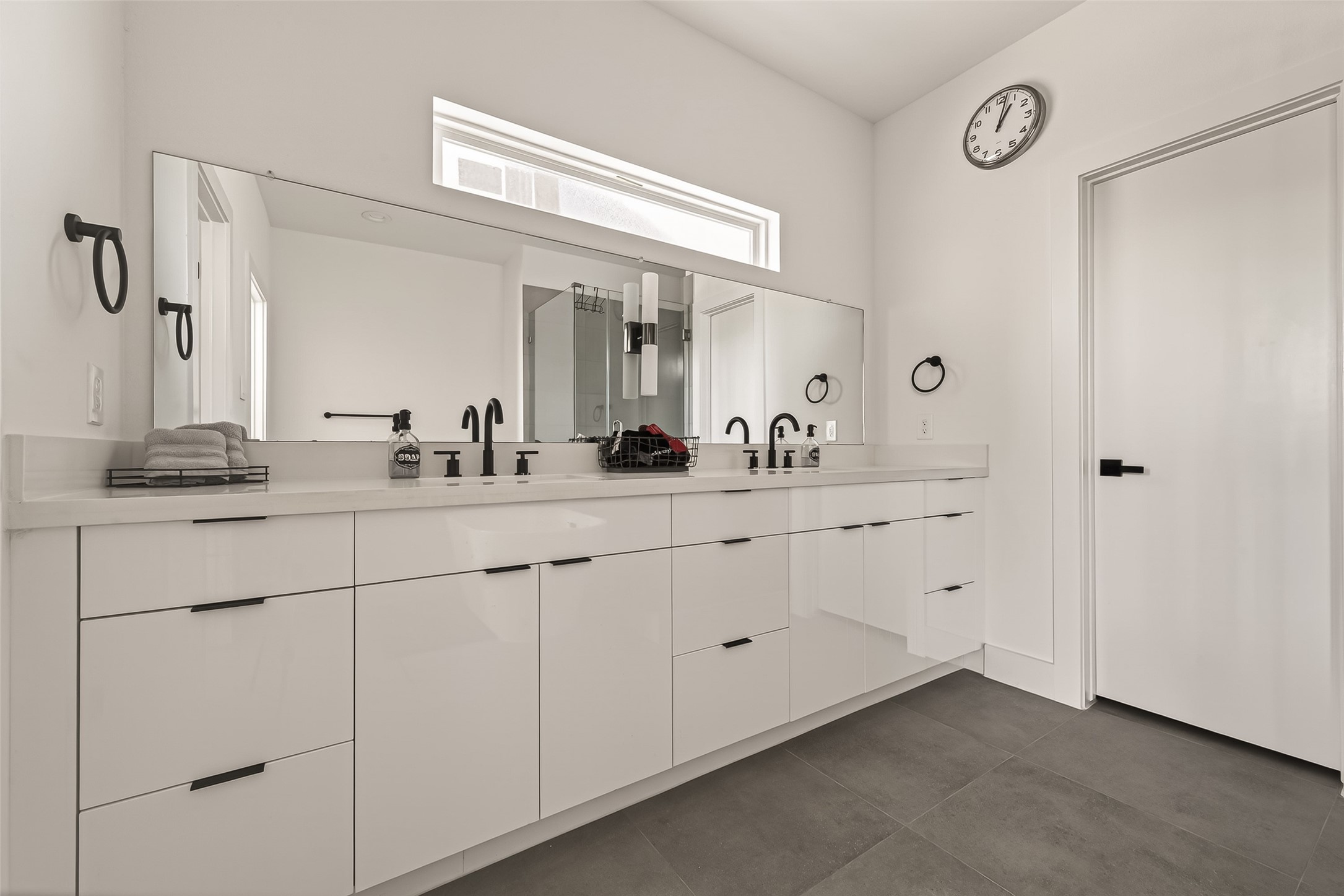 3402 Luca Street Houston, TX 77021 - Photo 30 of 36 a bathroom with a double vanity sink and a mirror