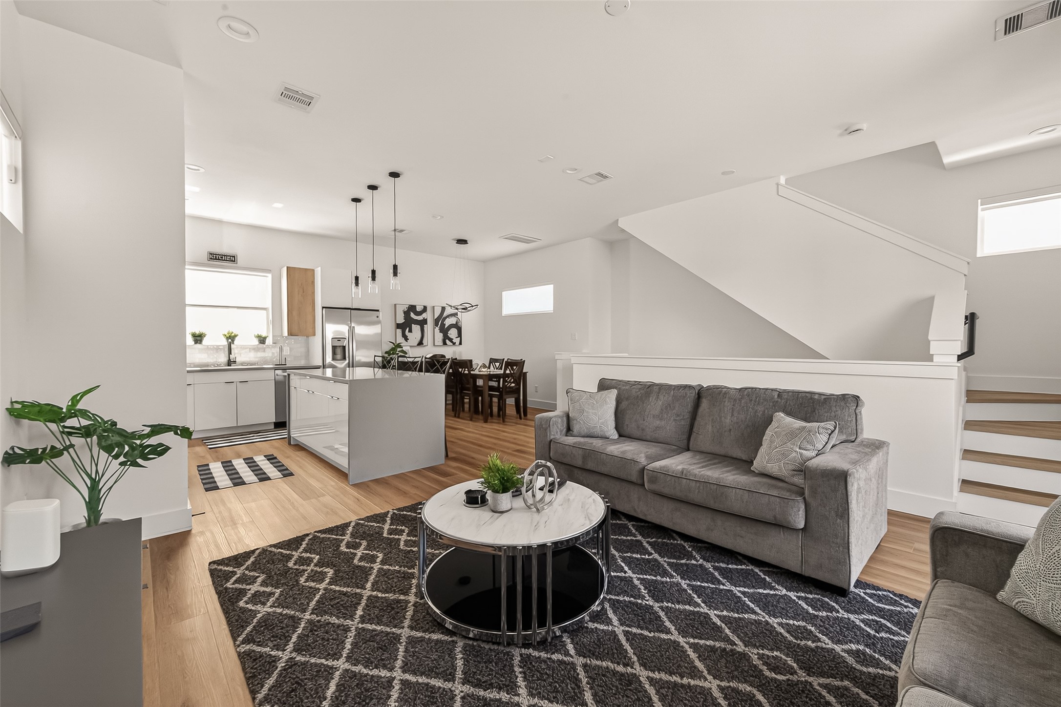 3402 Luca Street Houston, TX 77021 - Photo 6 of 36 a living room with furniture and kitchen view
