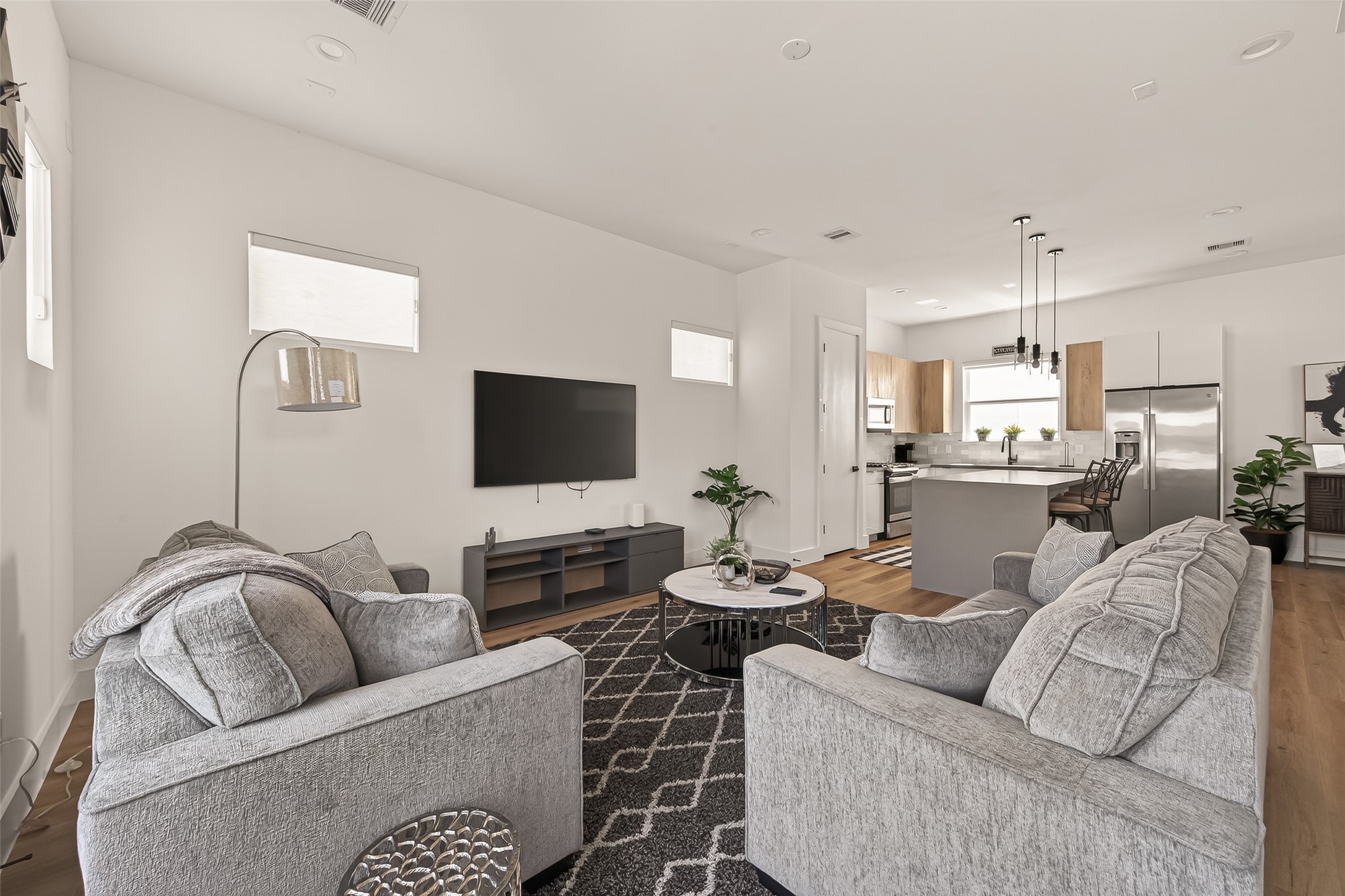 3402 Luca Street Houston, TX 77021 - Photo 7 of 36 a living room with furniture and a flat screen tv