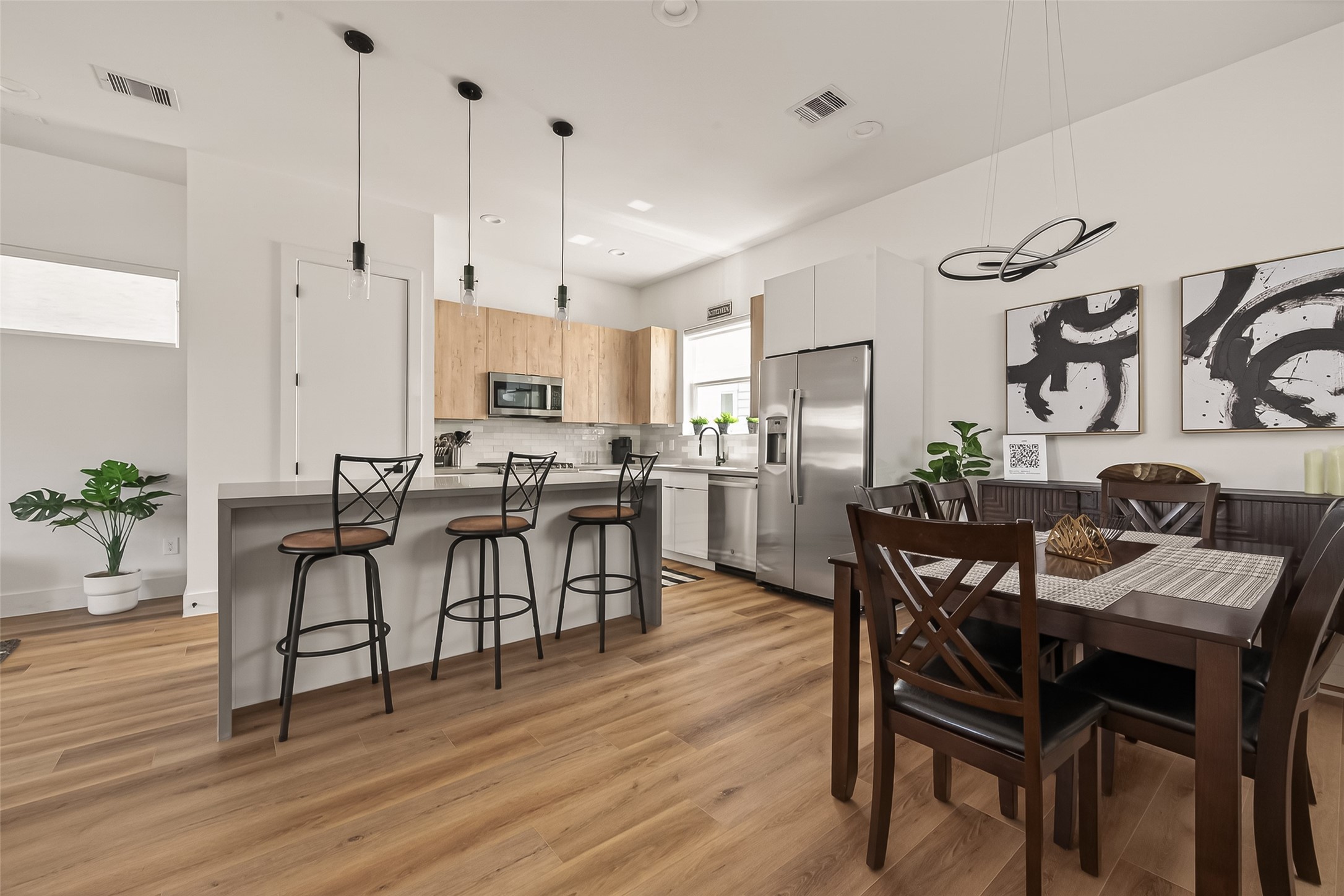 3402 Luca Street Houston, TX 77021 - Photo 8 of 36 a view of a dining room with furniture and wooden floor