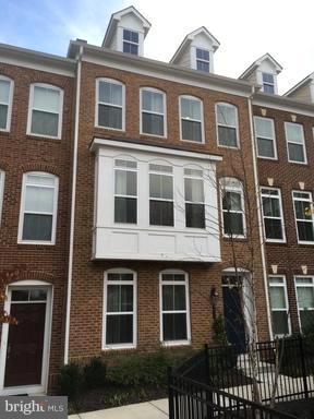 9650 Pullman Place Fairfax, VA 22031 - Photo 1 of 14 a front view of a building with glass windows