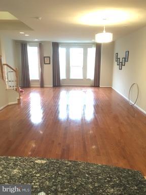 9650 Pullman Place Fairfax, VA 22031 - Photo 3 of 14 a view of a livingroom with wooden floor