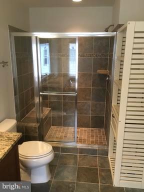 9650 Pullman Place Fairfax, VA 22031 - Photo 5 of 14 a bathroom with a toilet and a shower