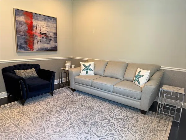 a living room with furniture and a couch