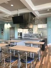 a kitchen with stainless steel appliances granite countertop a stove and a sink