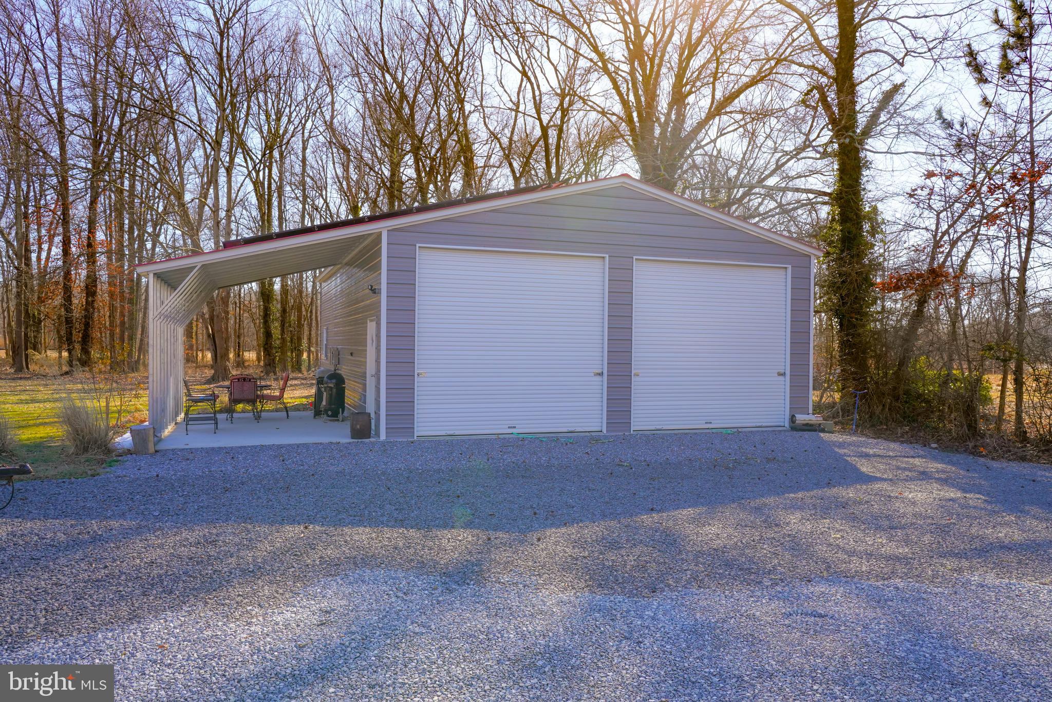 1435 Shadyrest Road Shady Side, MD 20764 - Photo 2 of 36 a view of backyard with large trees