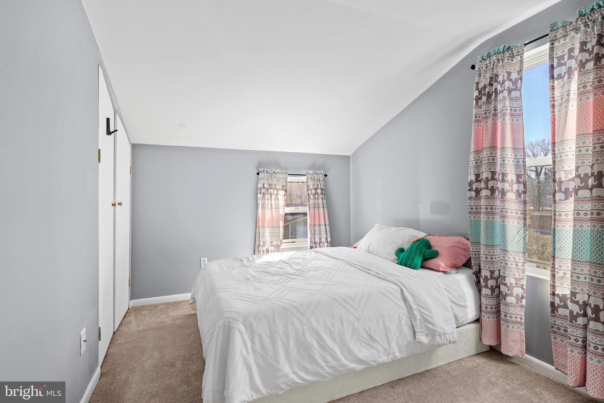 1435 Shadyrest Road Shady Side, MD 20764 - Photo 22 of 36 a bedroom with a bed and a window