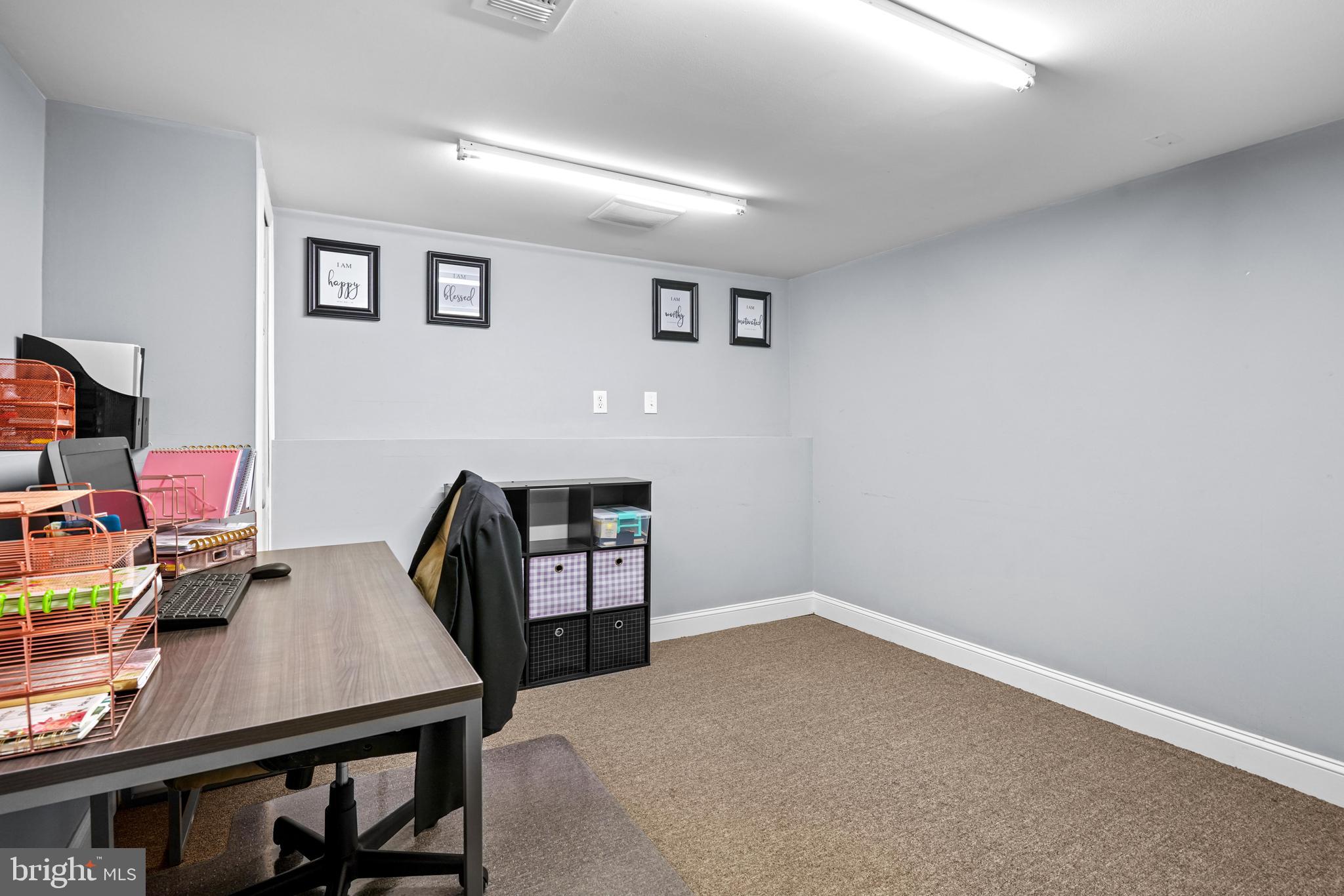 1435 Shadyrest Road Shady Side, MD 20764 - Photo 28 of 36 a workspace with furniture and wooden floor